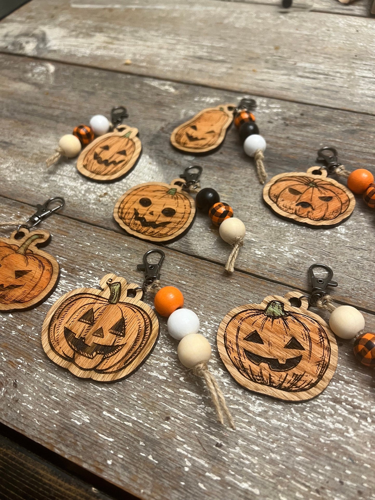 Laser-Cut, Engraved, and Hand-Painted Hard Wood Halloween Pumpkin Keychains